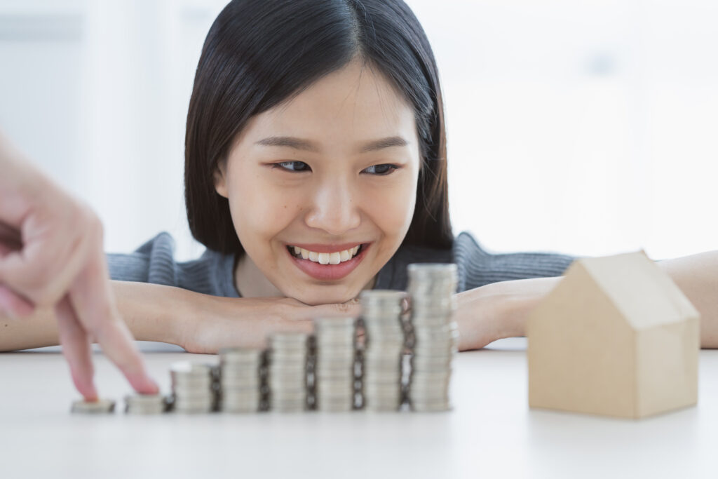 happiness asian woman hand with coin stack financial business id